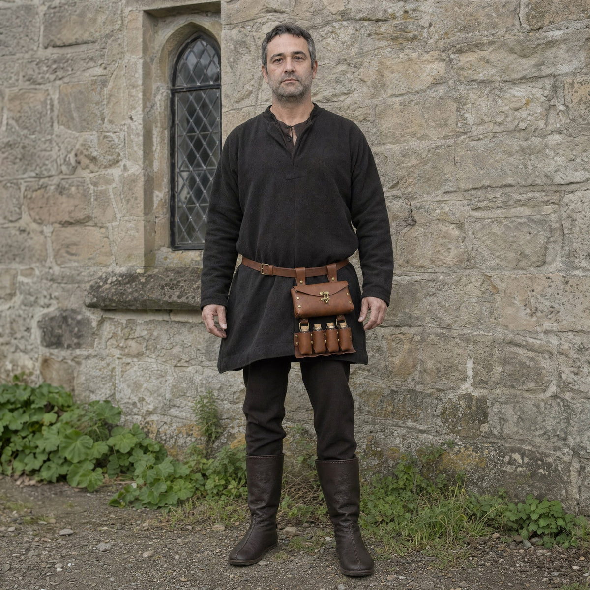 Brown belt with pouch and potion vials worn outdoors, full-length front view