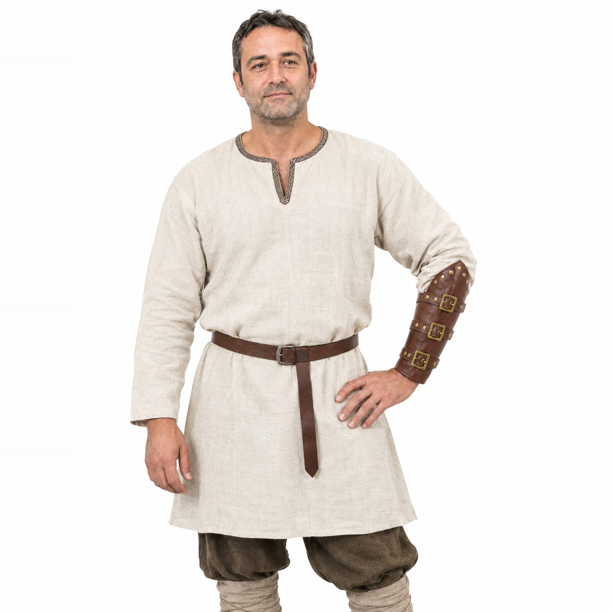 Brown brass-buckle Viking bracer worn by a model on a white background