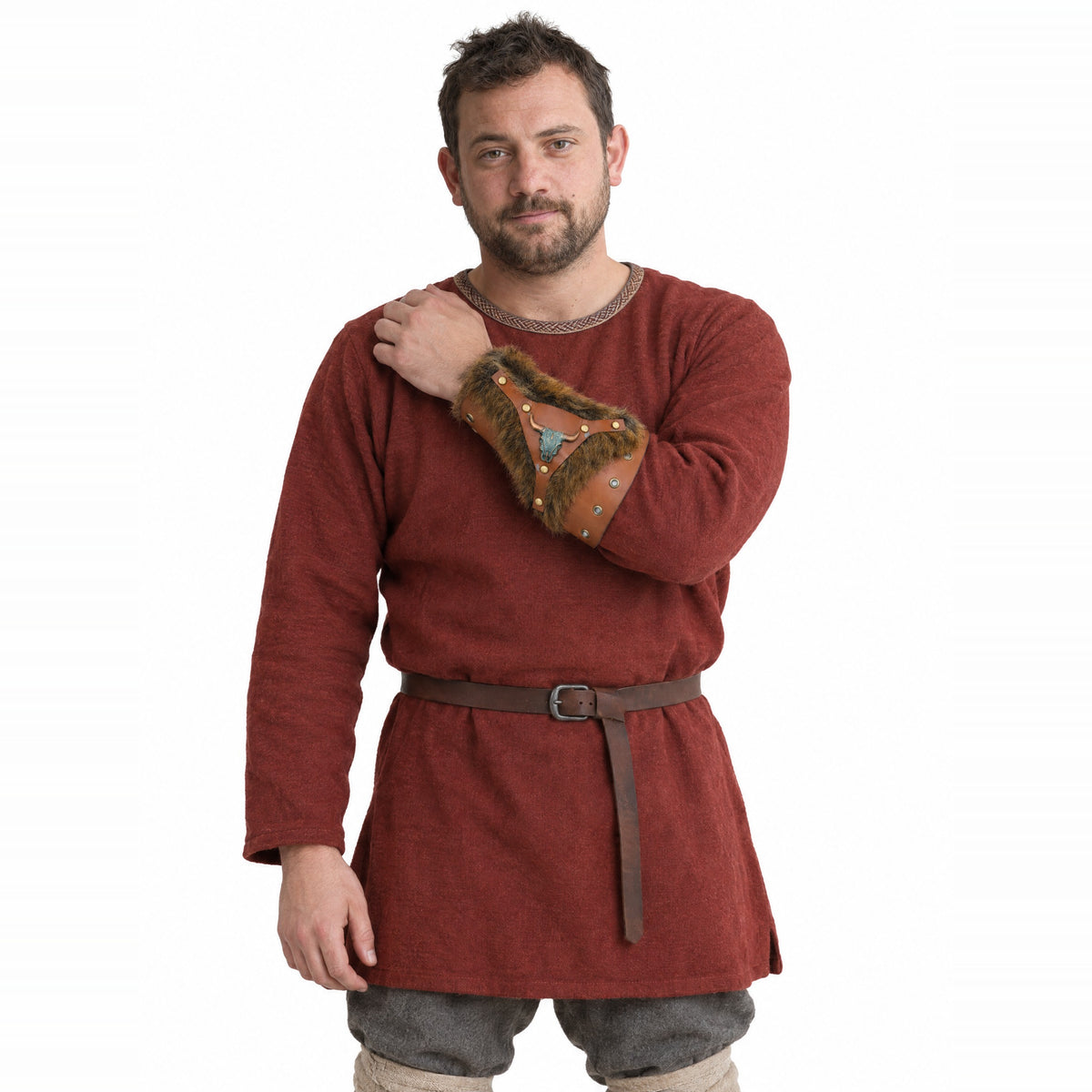 Brown bull head bracer with fur trim worn by a model on a white background