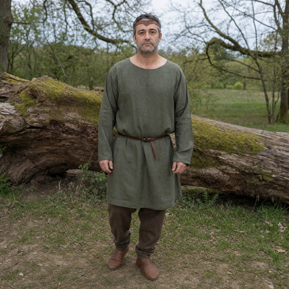 Brown Celtic knotwork headband worn across the brow outdoors, full-length front view