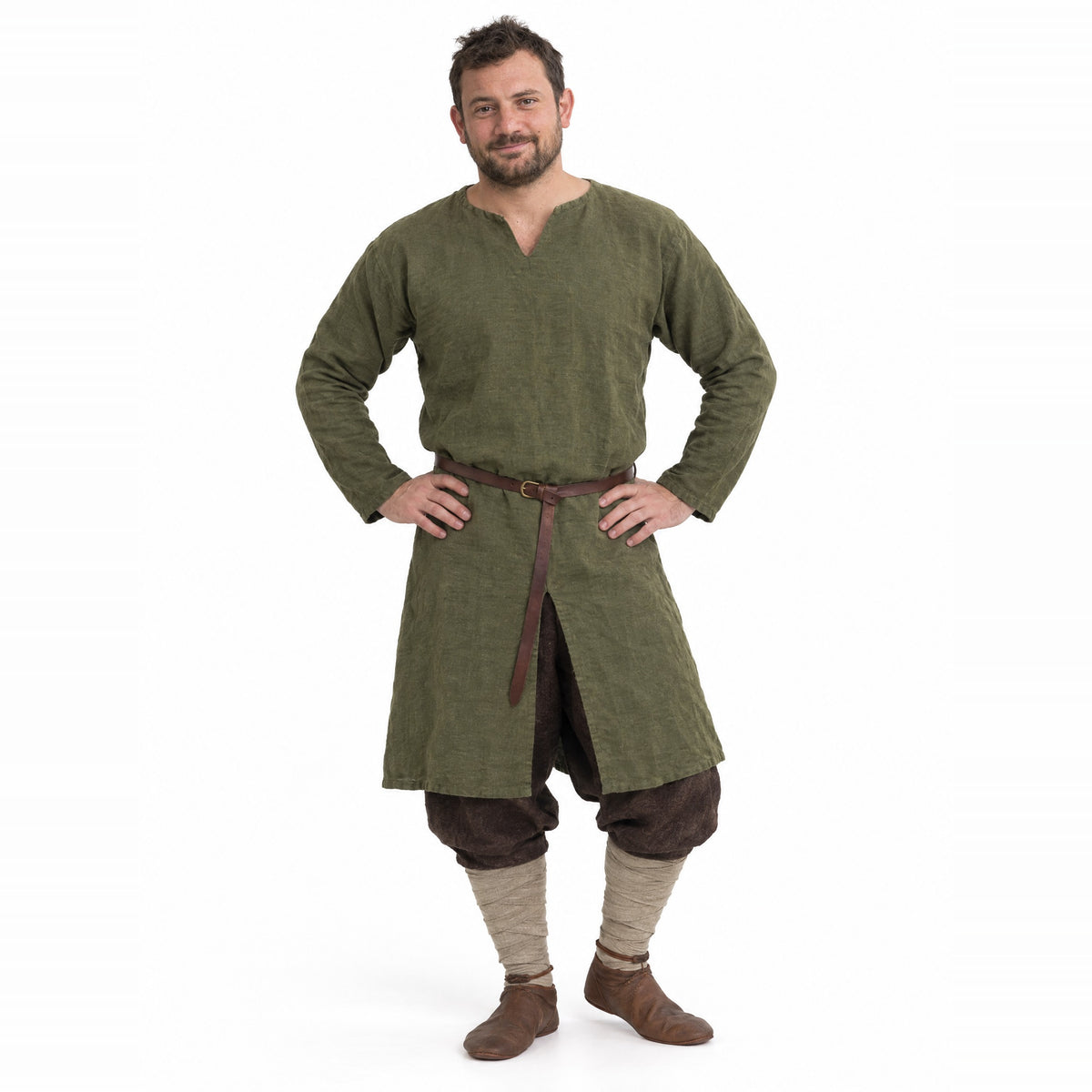 Green cotton viking tunic worn by a model on a white background