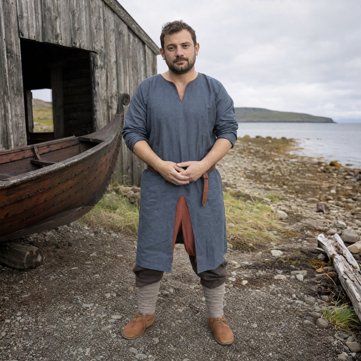 Dark Blue cotton Viking tunic worn by a man outdoors, full-length front view