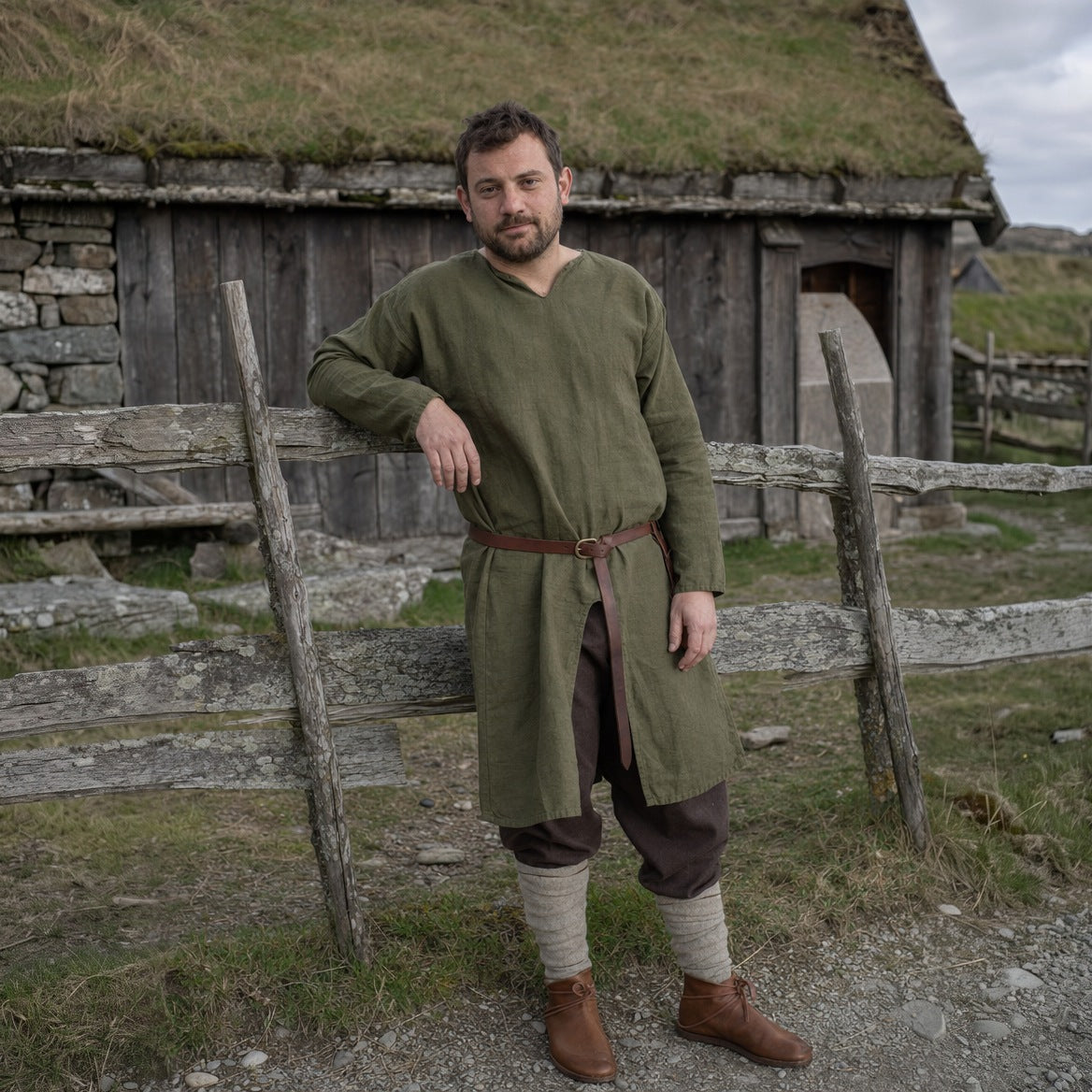 Cotton Viking tunic styled with a wide belt, trousers and boots