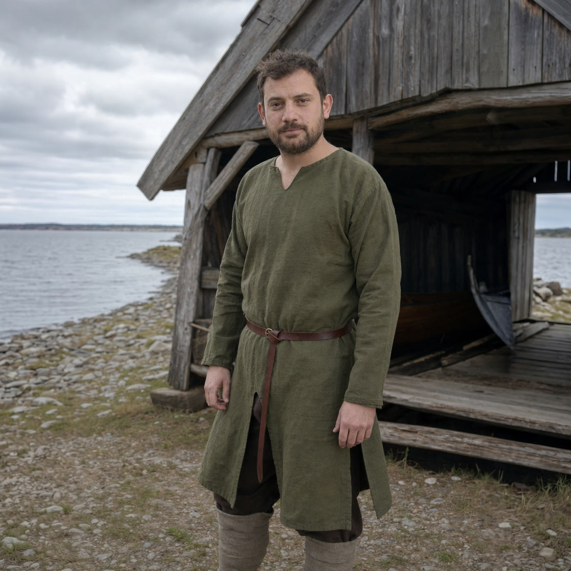 Green cotton Viking tunic, three-quarter view of the laced details