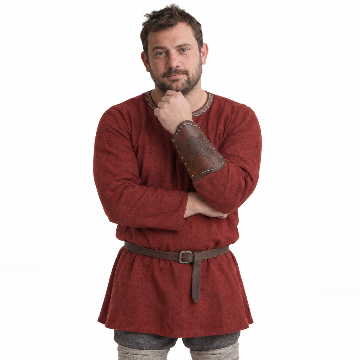 Brown crossed axes bracer worn by a model on a white background