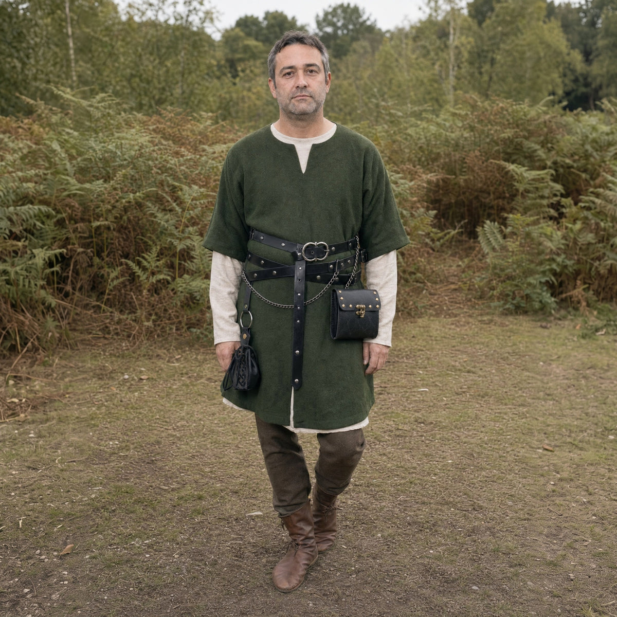Black double belt with waist bag and round pouch worn outdoors, full-length front view