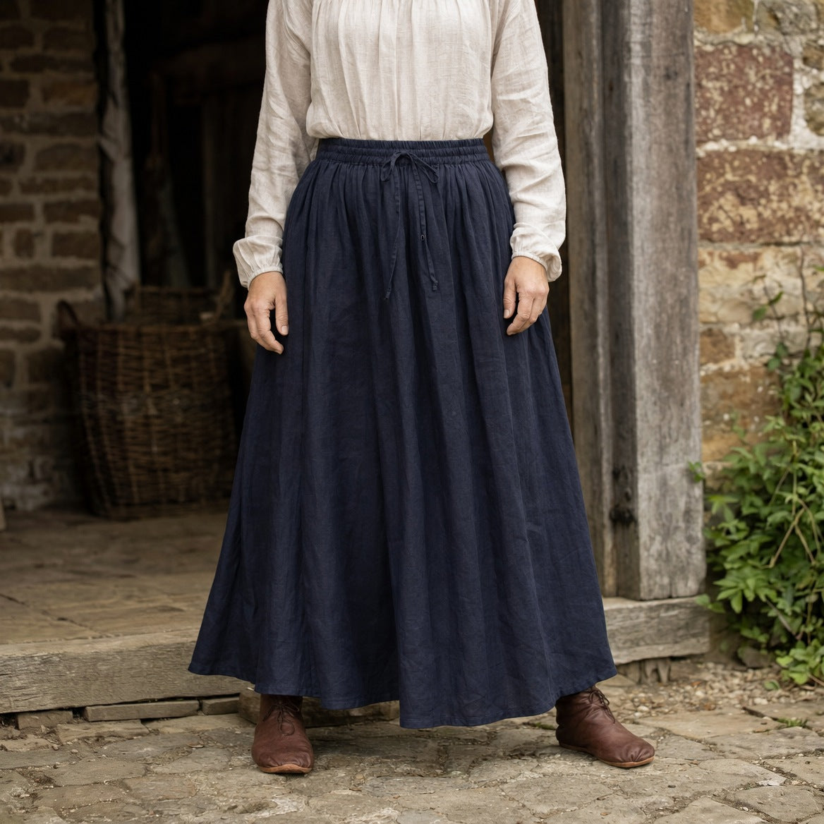 Drawstring ramie skirt on a wearer, showing where the hem falls
