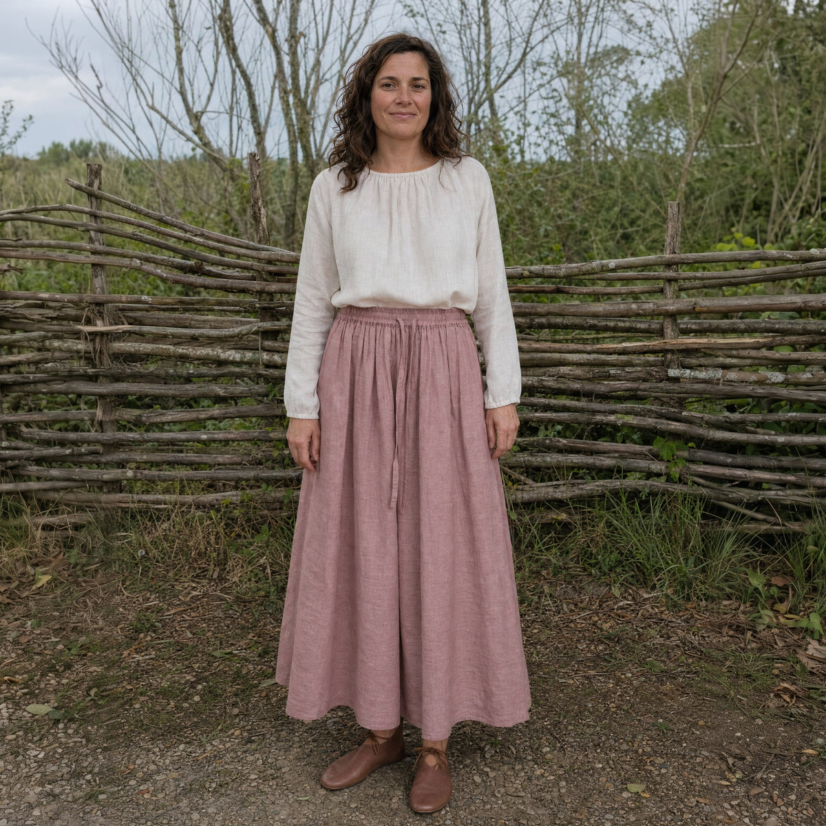 Pale Pink drawstring ramie skirt worn by a woman outdoors, full-length front view