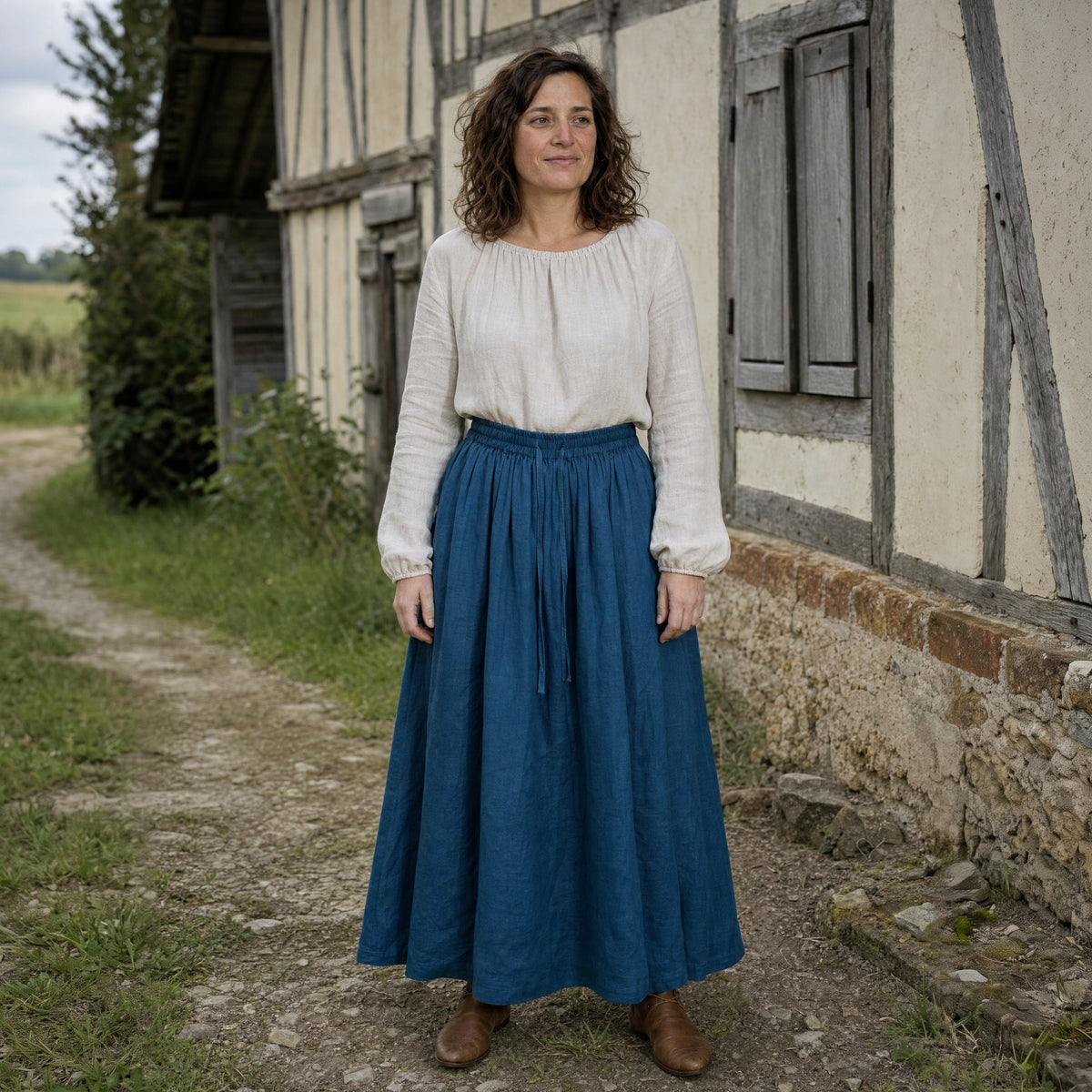 Peacock Blue drawstring ramie skirt worn by a woman outdoors, full-length front view