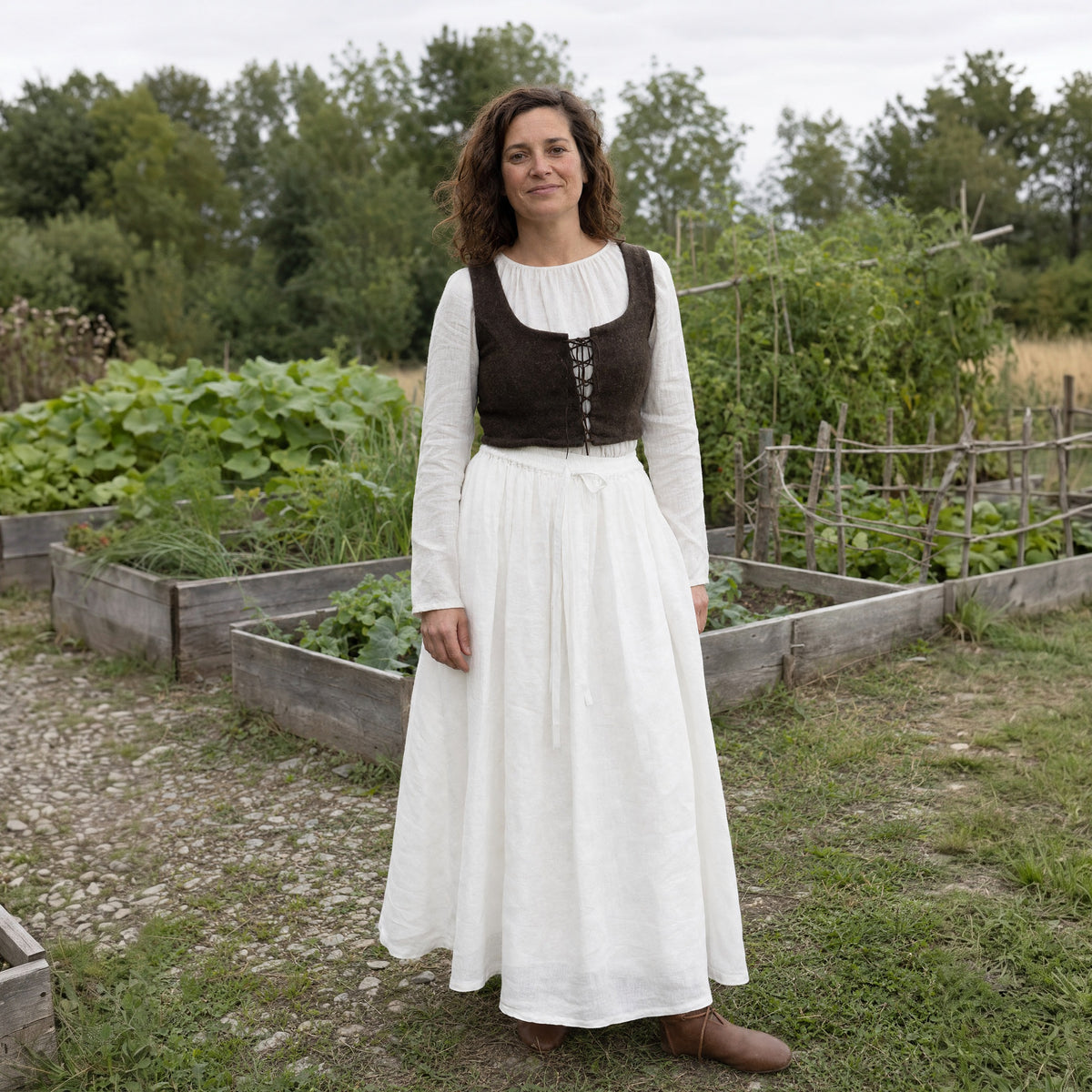 White drawstring ramie skirt worn by a woman outdoors, full-length front view