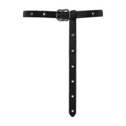Black eyelet belt with ornate buckle