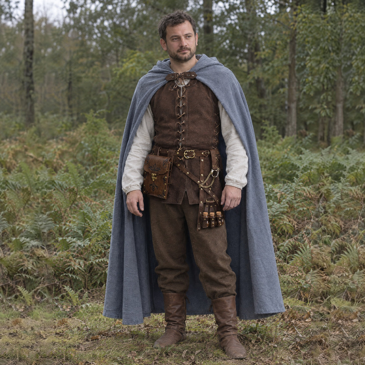 Embossed waist bag belt with potion holder in a complete ranger outfit, worn by a man outdoors