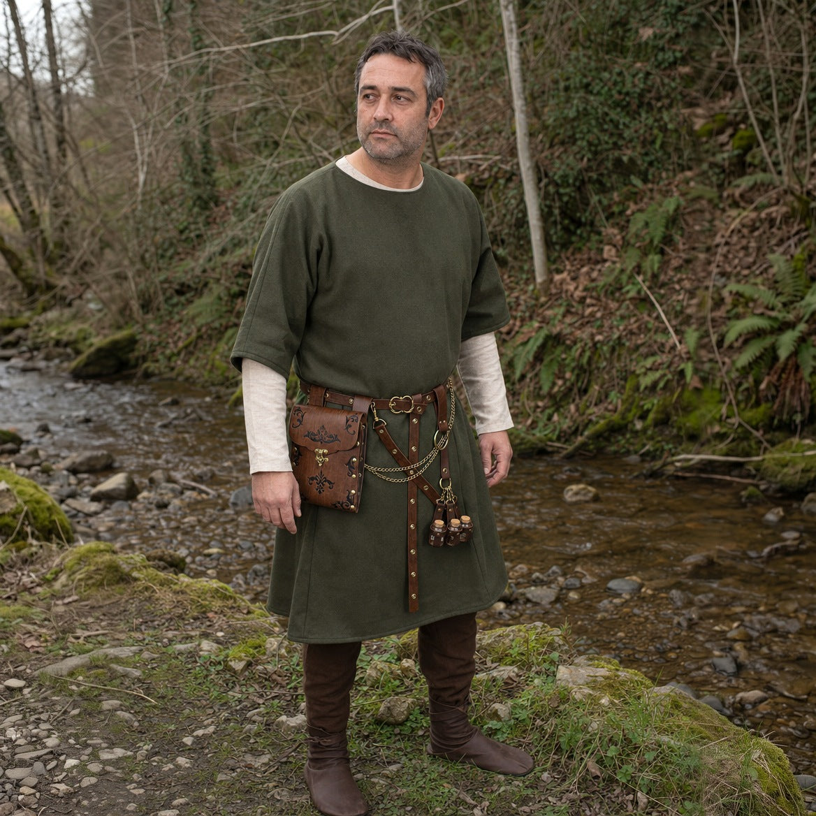 Brown embossed waist bag belt with potion holder, three-quarter view of the pieces at the hip