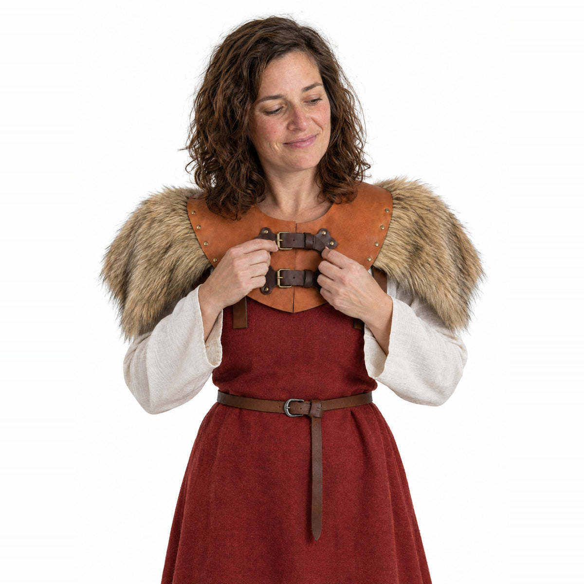 Brown & tan faux fur shoulder mantle worn by a model on a white background