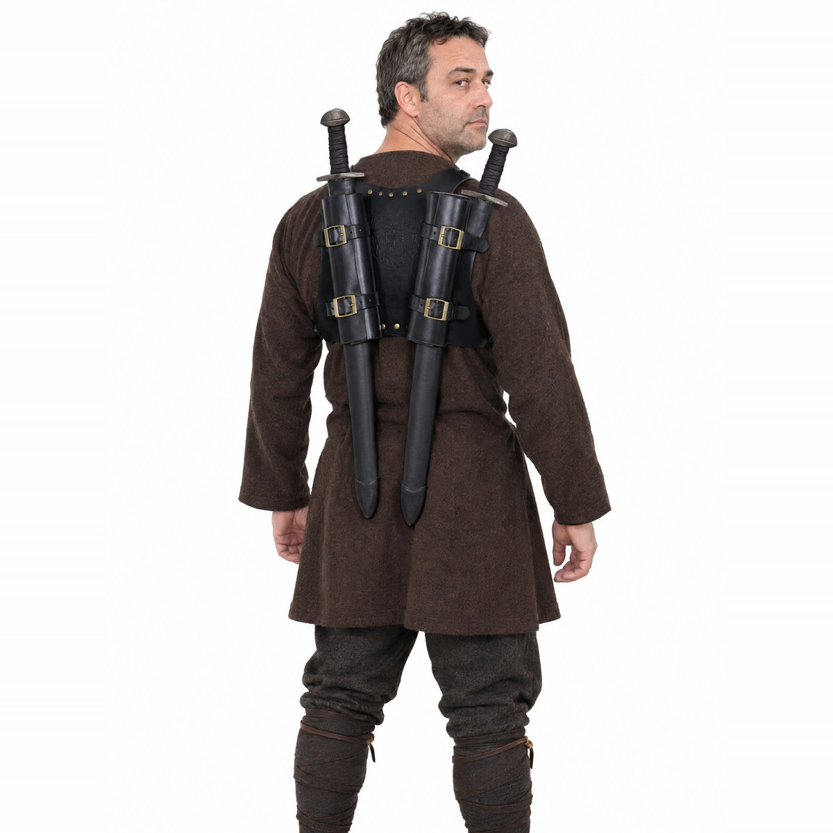 Black faux leather double sword harness worn by a model on a white background