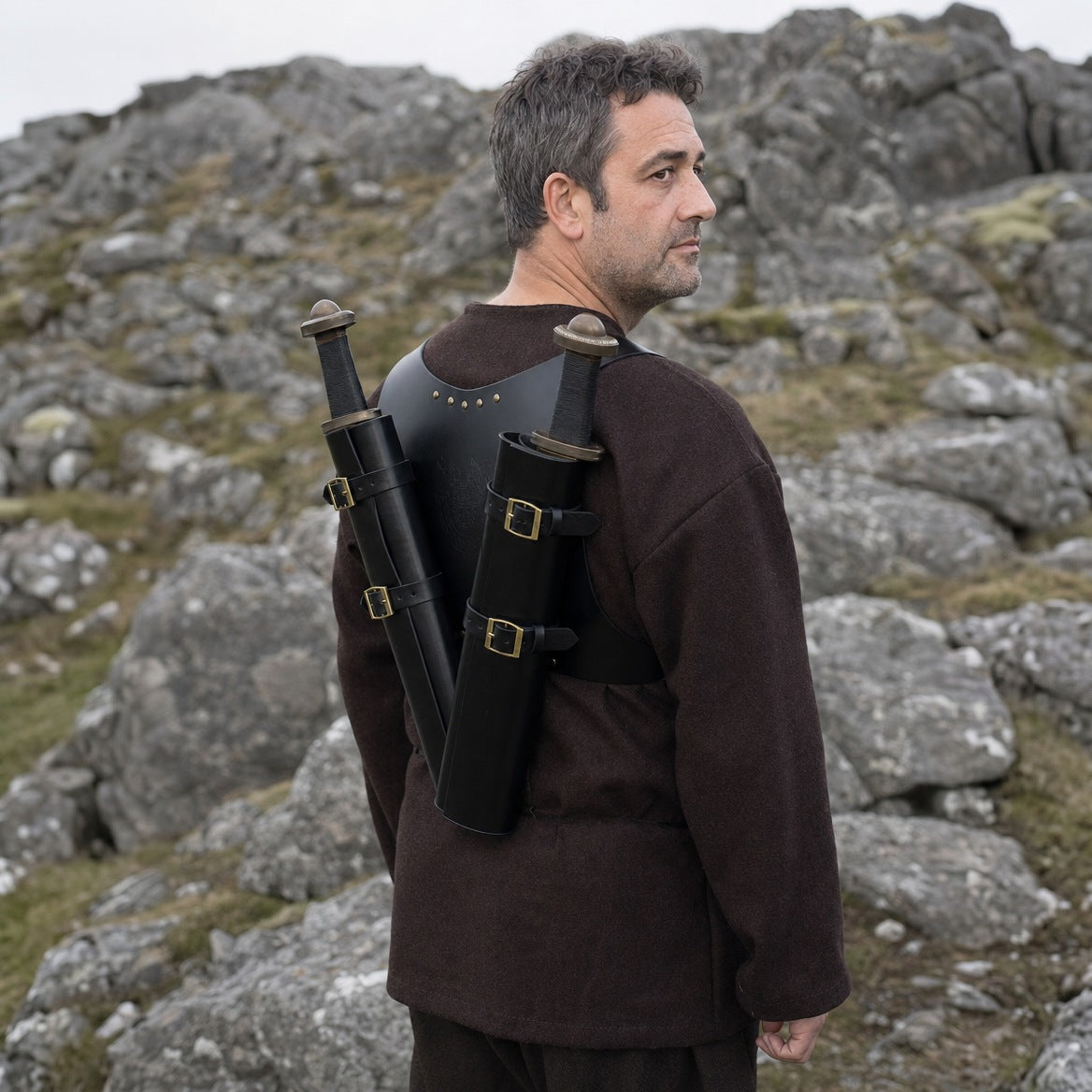 Black double sword harness, three-quarter view of the straps and sword hilts
