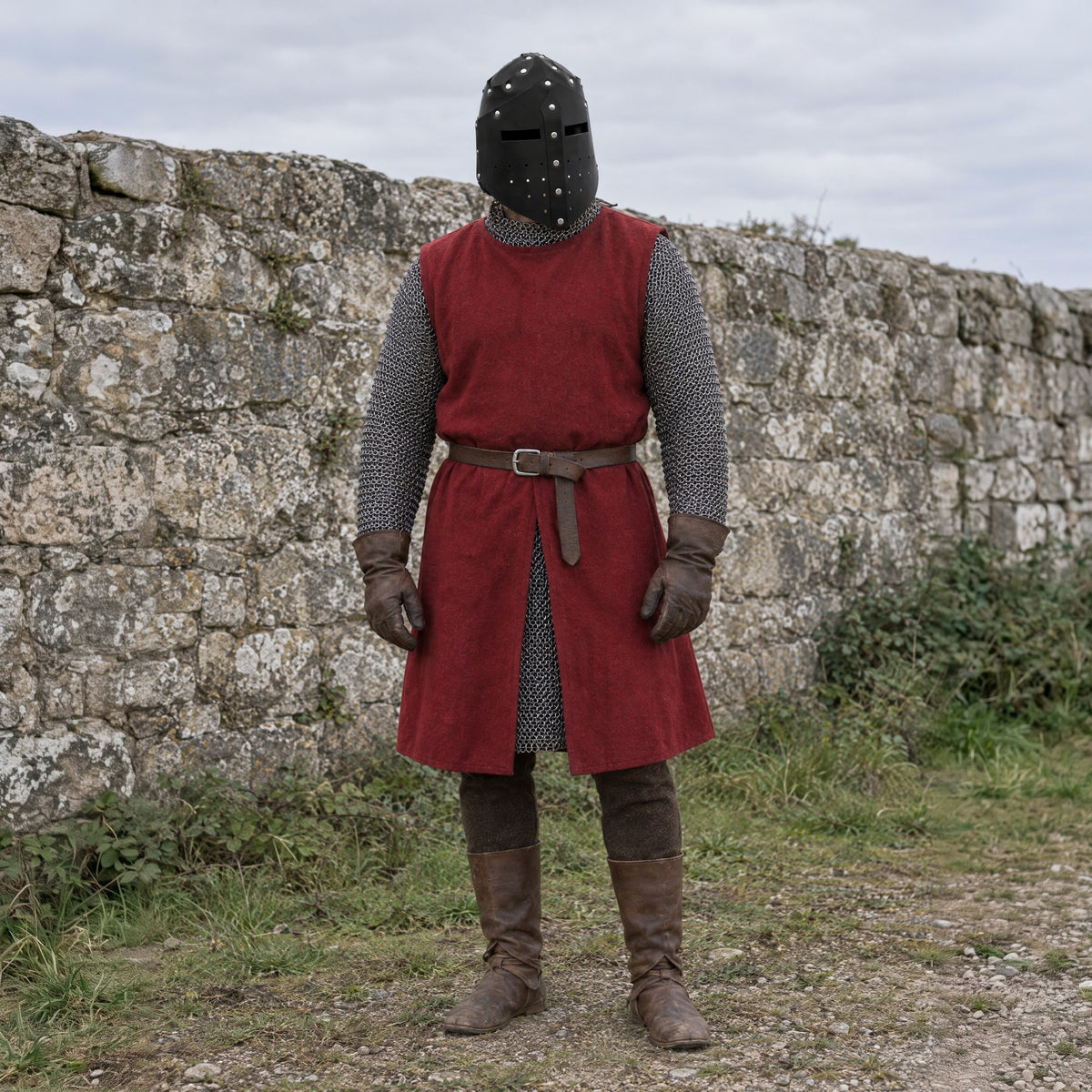 Black faux leather great helm worn with a knight costume outdoors, full-length front view