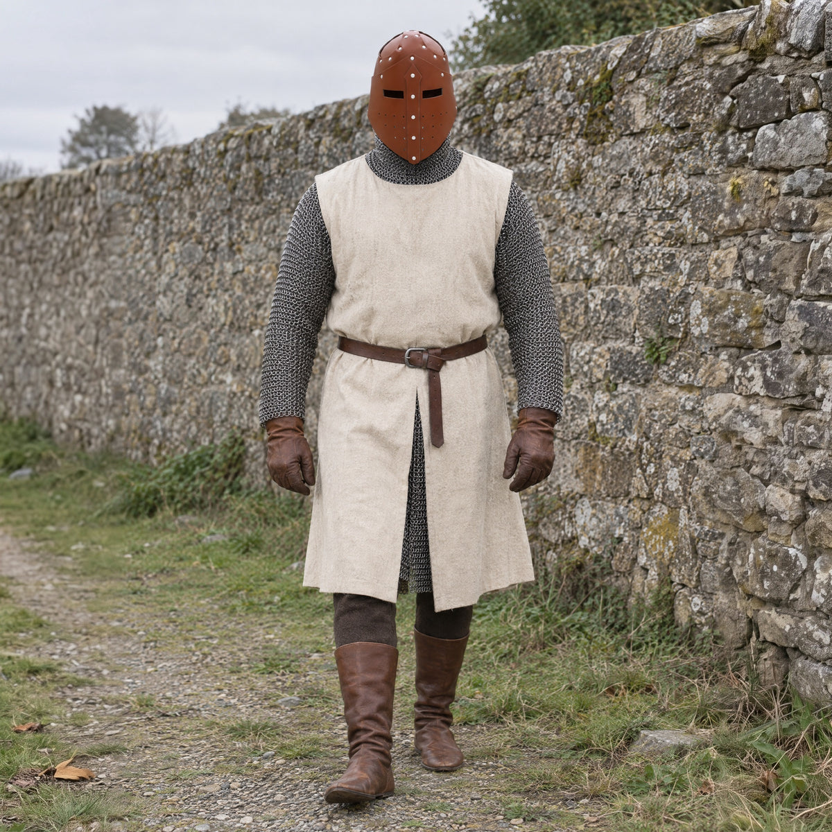 Brown faux leather great helm worn with a knight costume outdoors, full-length front view
