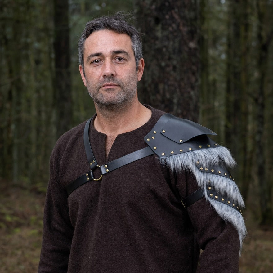 Buckled fur-trim pauldron on a wearer, showing how far it reaches over the shoulder