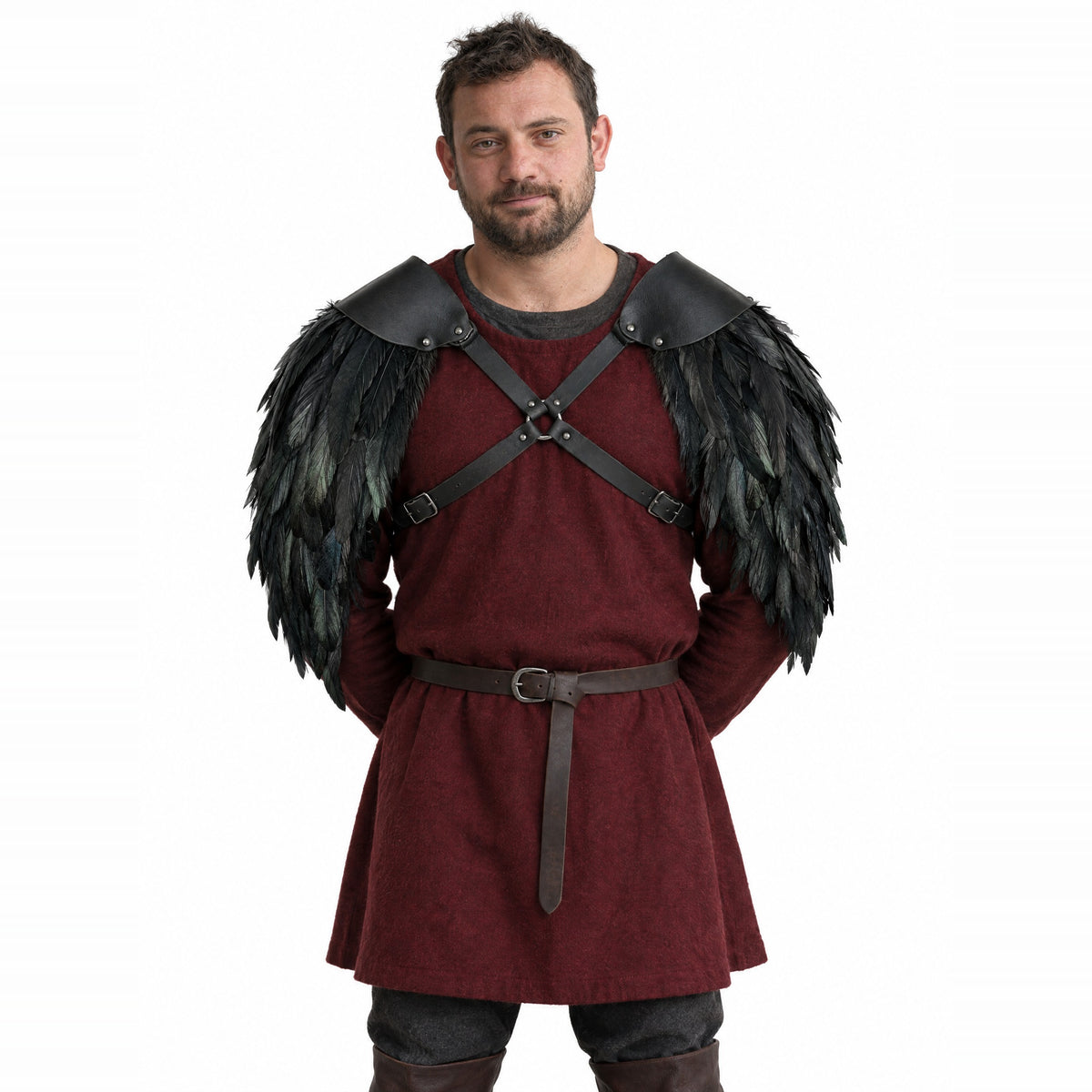 Black feathered double pauldrons worn by a model on a white background