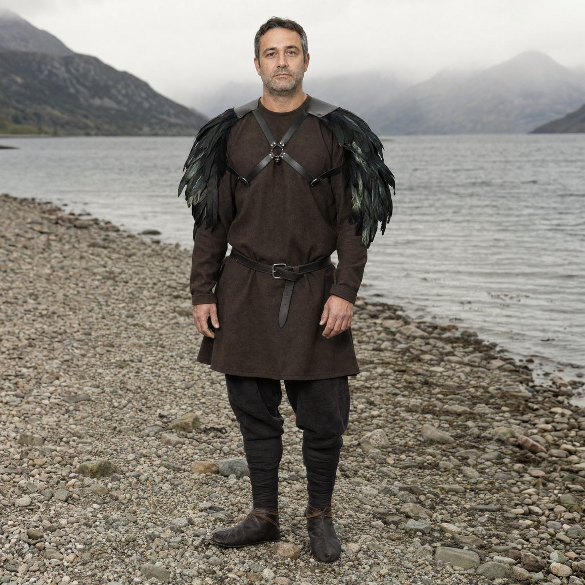 Black feathered double pauldrons worn outdoors, full-length front view