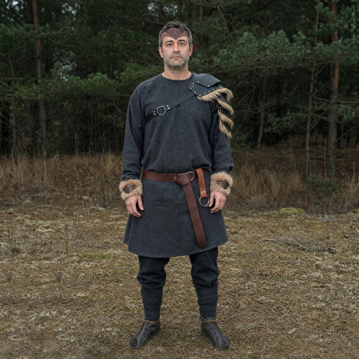 Brown five-piece fur armour set worn outdoors, full-length front view