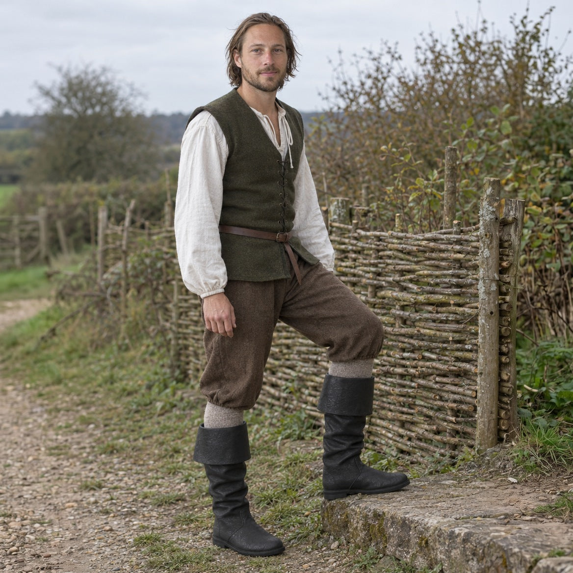 Black fold-over cuff renaissance boots worn outdoors