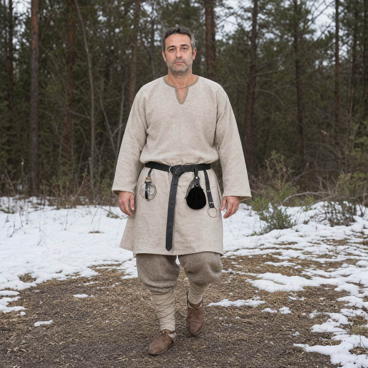 Black four-piece ring belt kit worn outdoors, full-length front view