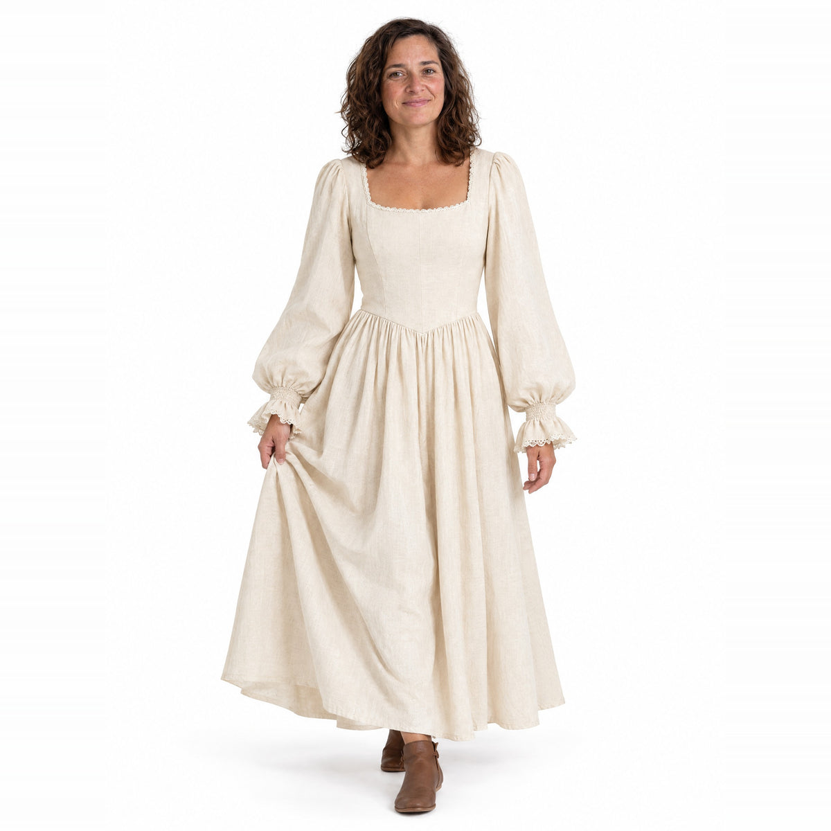 Full-skirt folk dress worn by a model on a white background