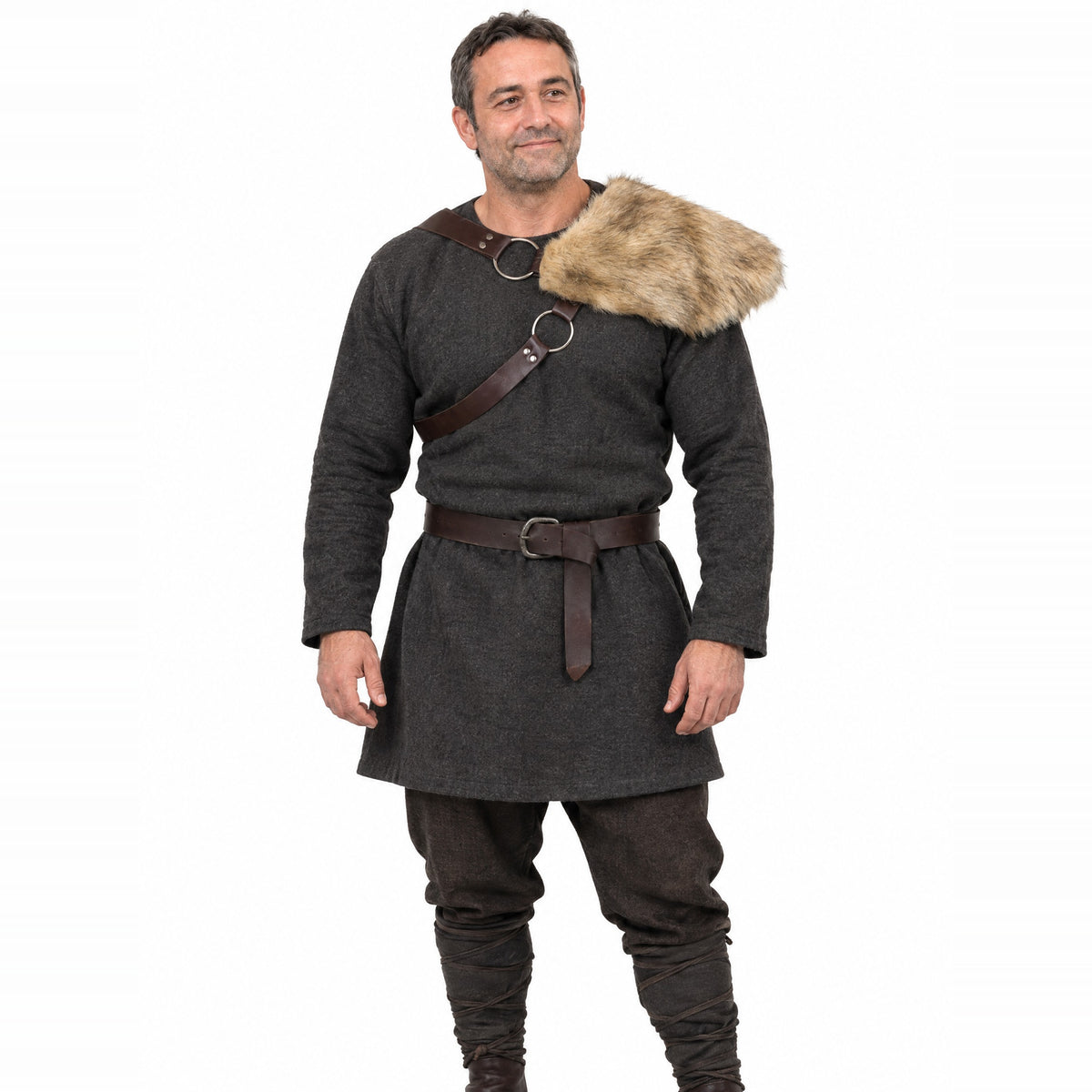 Brown fur-look single pauldron worn by a model on a white background
