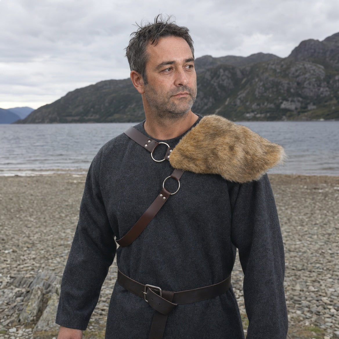Brown fur-look single pauldron, three-quarter view of the shoulder