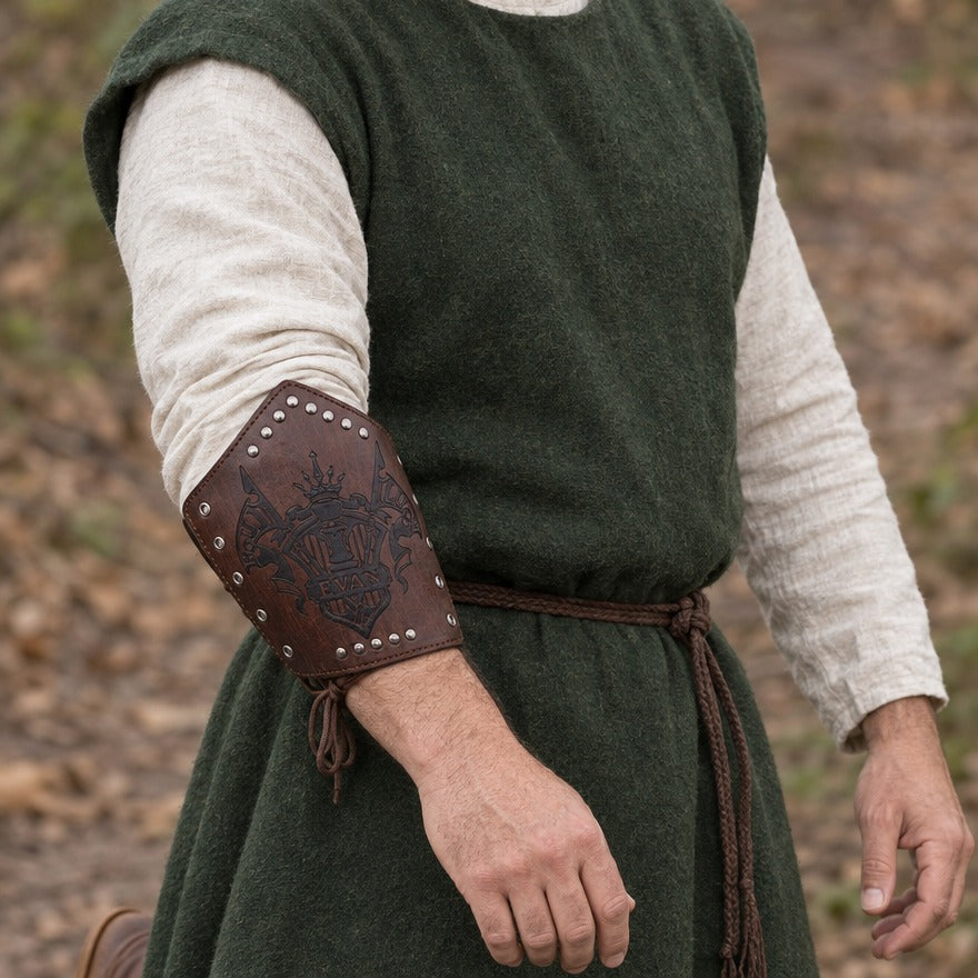 Heraldic banner bracer on a forearm, showing the 21.5 cm length from wrist towards elbow