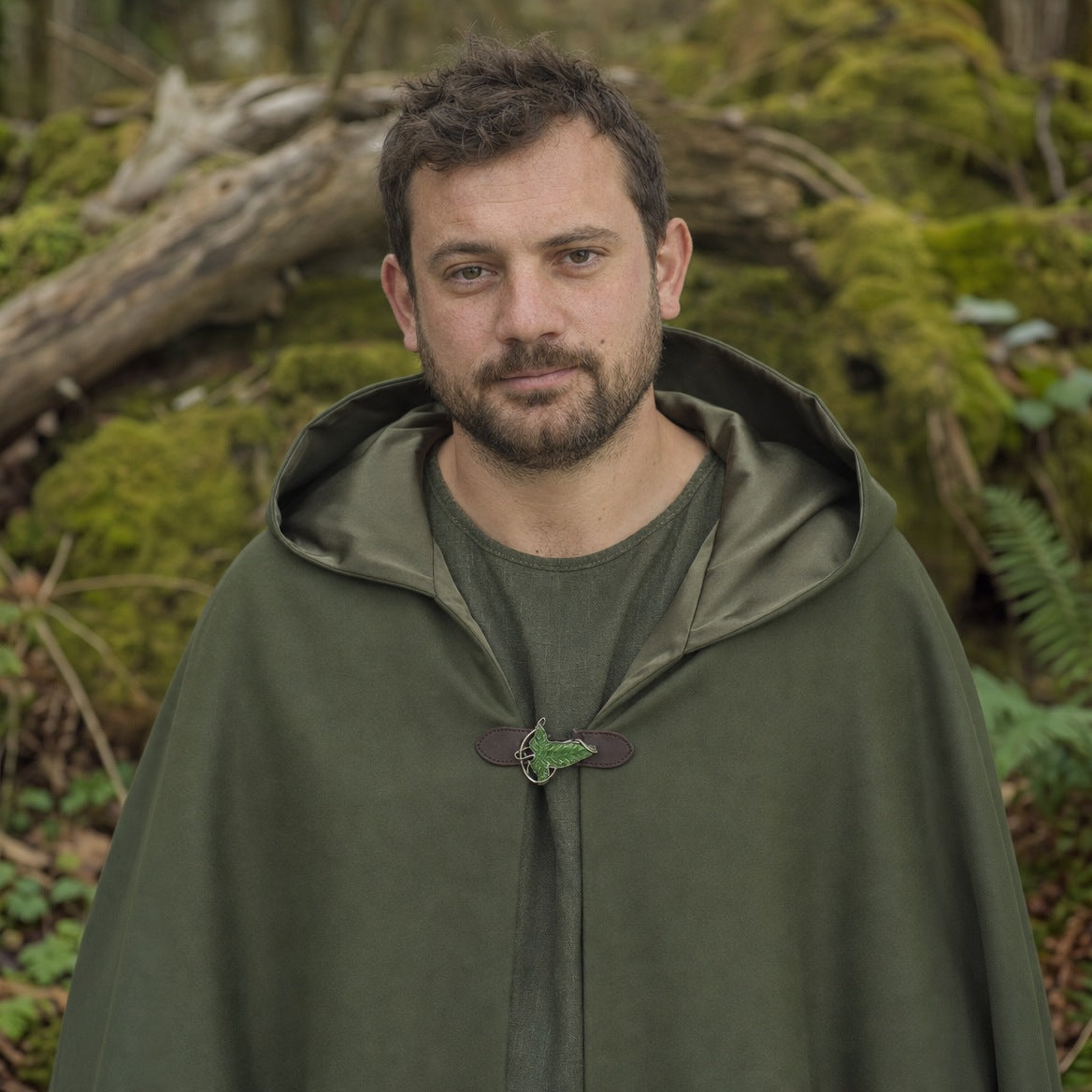 Hooded cloak on a wearer, showing where the length falls