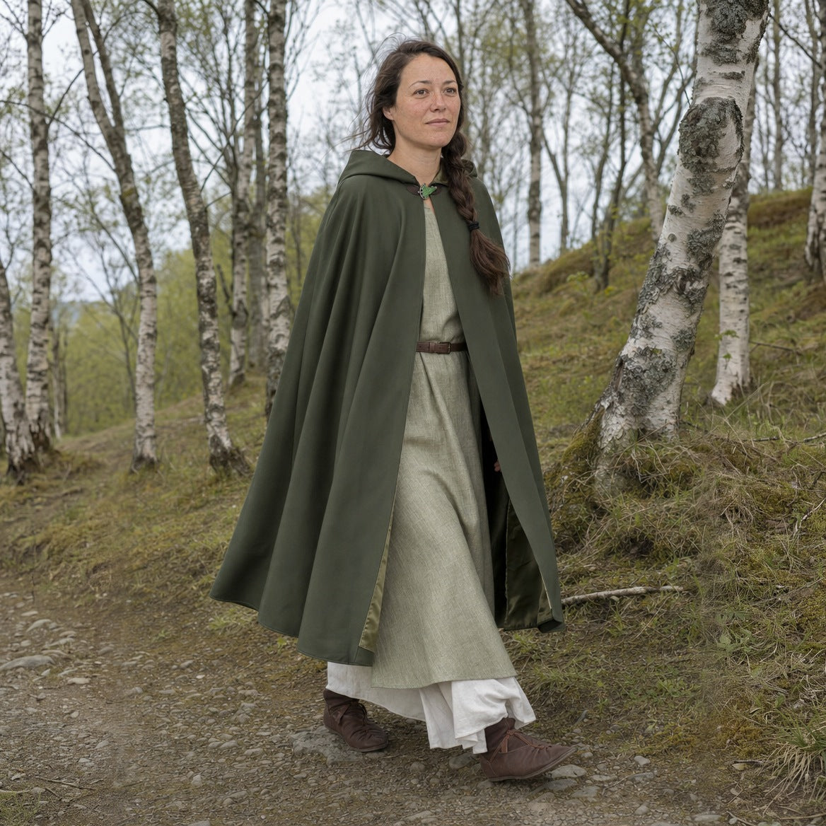Green hooded cloak worn outdoors
