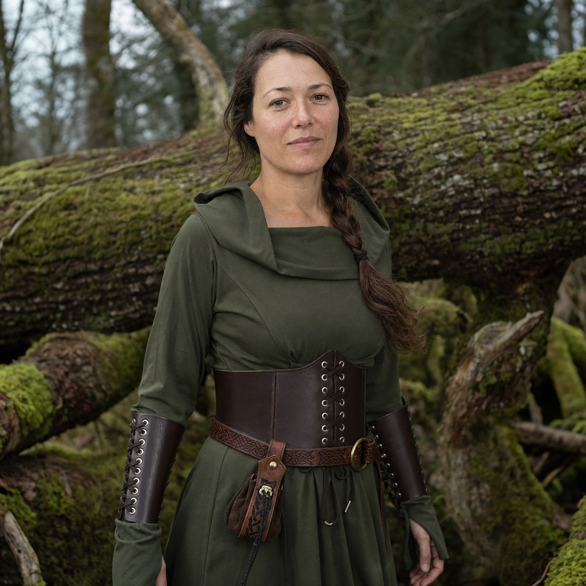 Hooded elf dress on a wearer, showing the shorter front hem and sleeve length