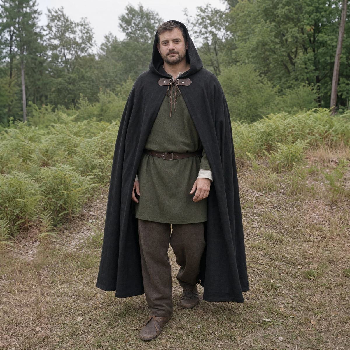 Black hooded ranger cloak worn outdoors, full-length front view
