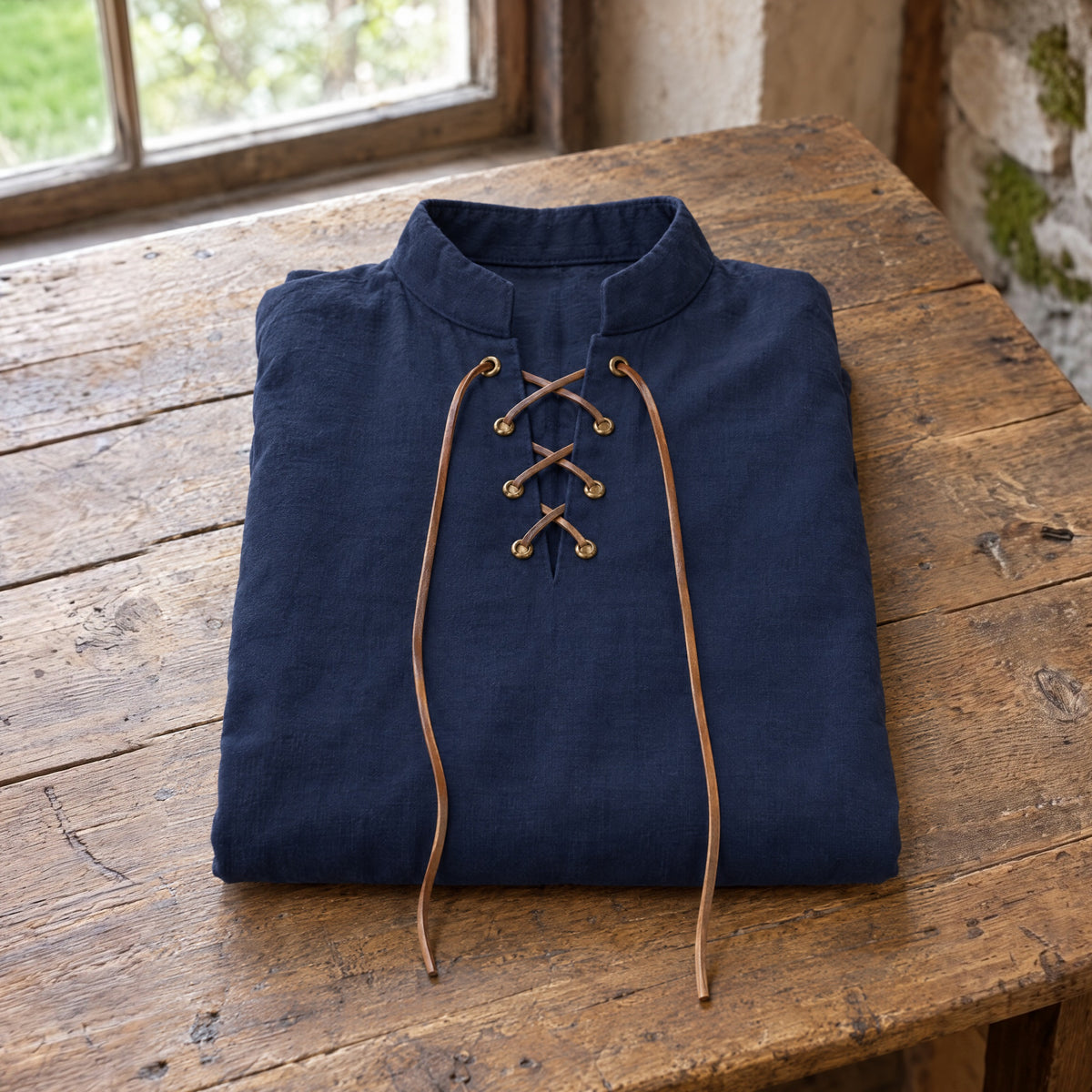 Navy kids' stand-collar shirt on a rustic surface