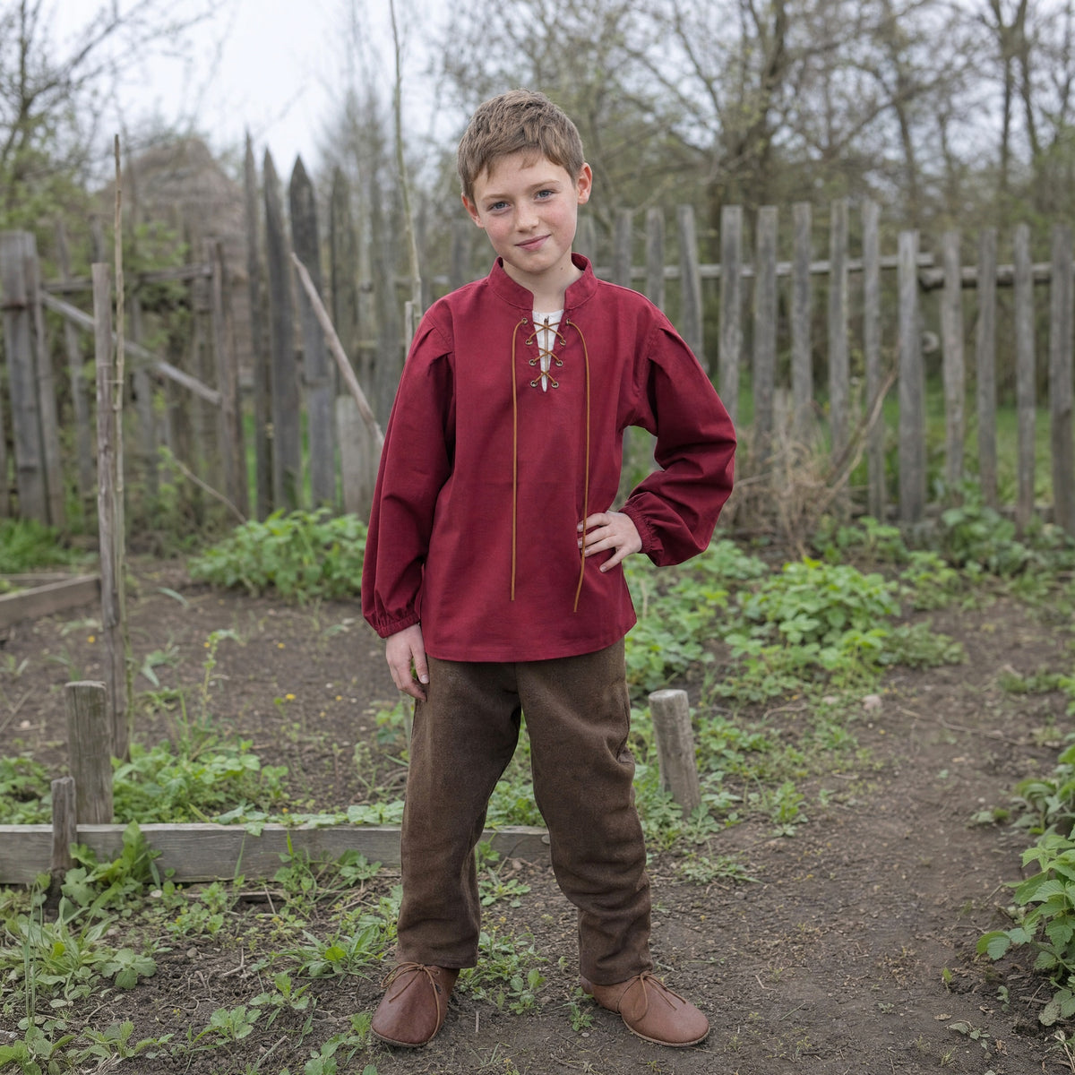 Red kids' stand-collar shirt worn by a child outdoors, full-length front view