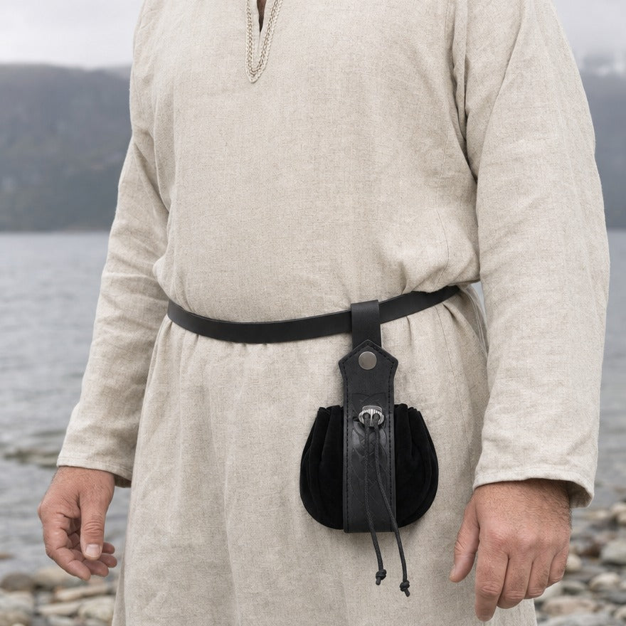 Knotwork drawstring belt pouch on a wearer's belt, showing its 18 cm height