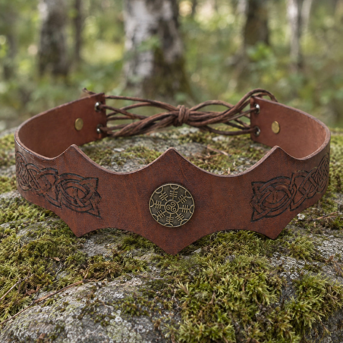 Brown & bronze knotwork circlet with medallion on a rustic surface