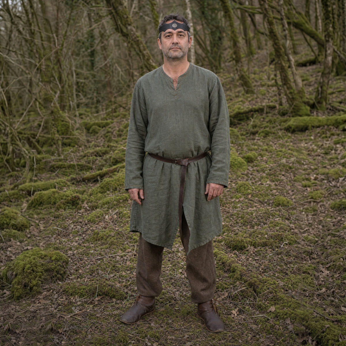 Black & Silver knotwork circlet with medallion worn across the brow outdoors, full-length front view