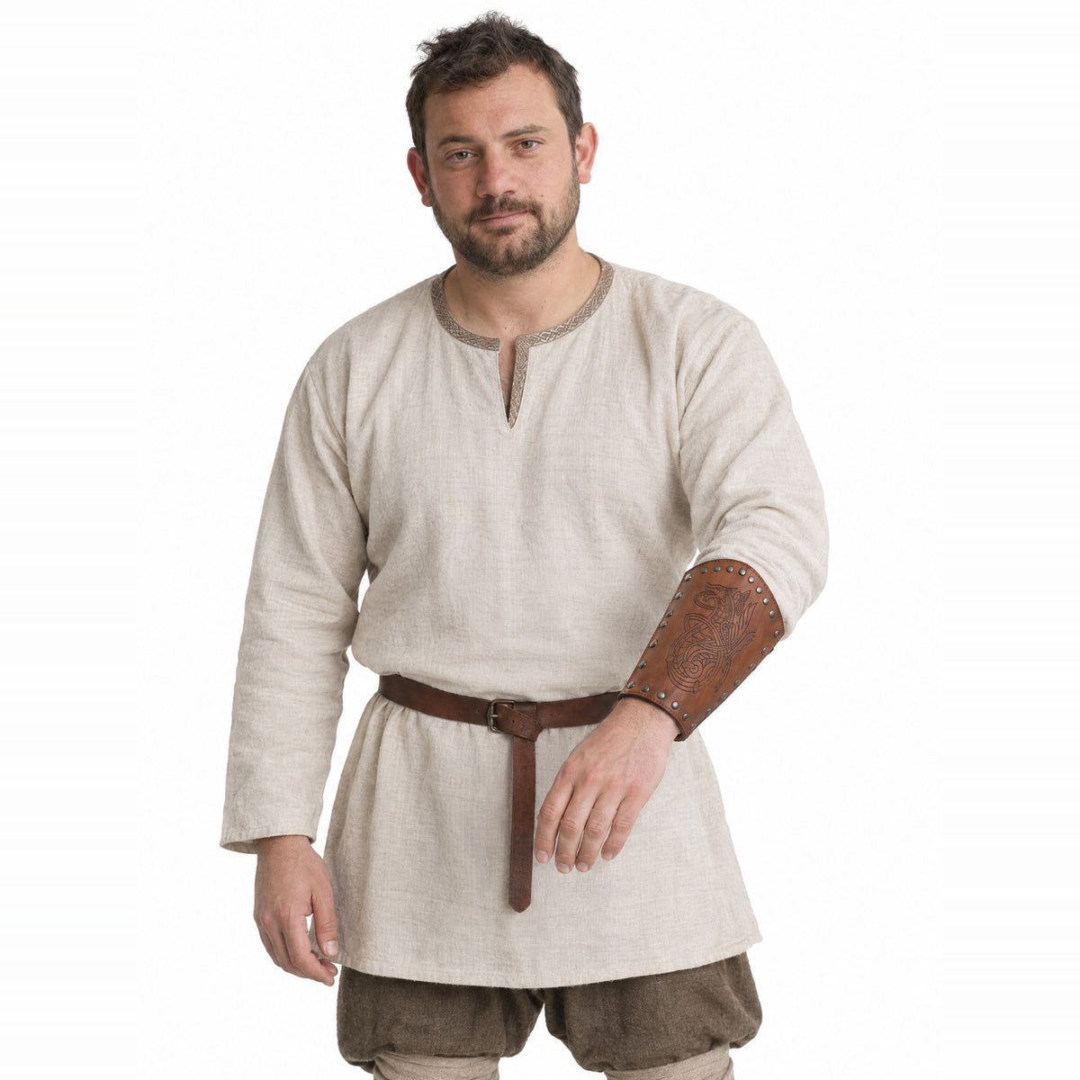 Brown knotwork wolf bracer worn by a model on a white background
