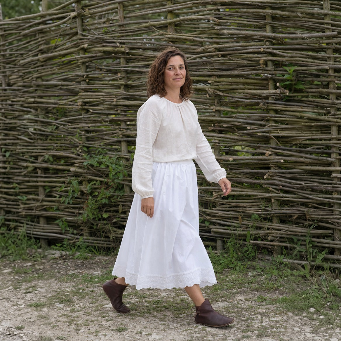 White lace-hem cotton petticoat worn outdoors