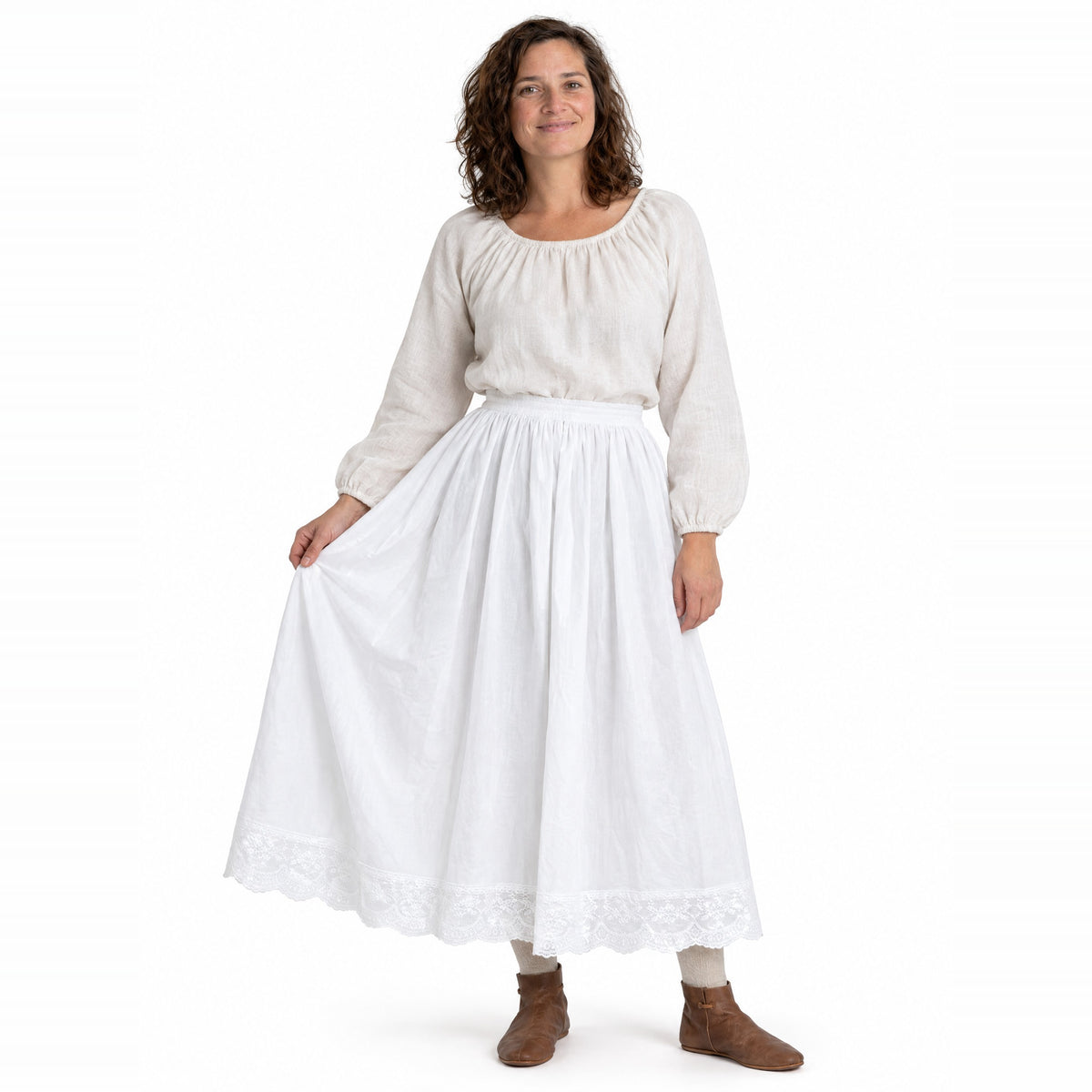 White lace-hem cotton petticoat worn by a model on a white background