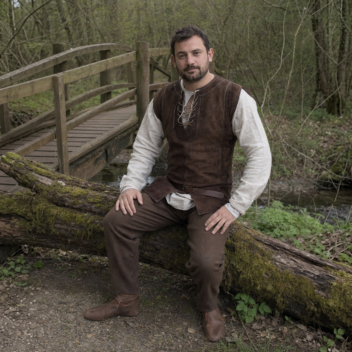 Brown lace-up hunter vest worn seated on a log, over a plain shirt with trousers and boots