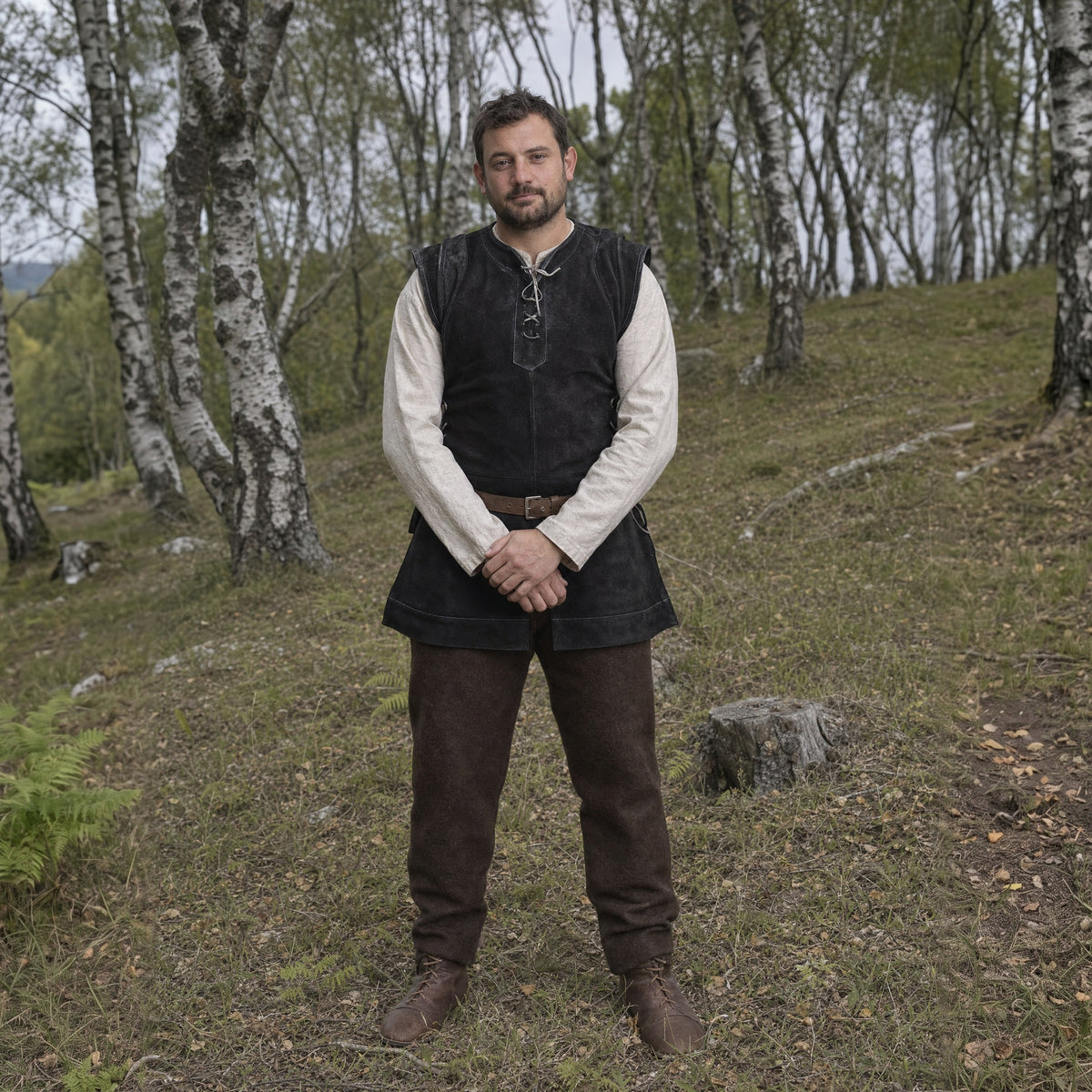 Black lace-up hunter vest worn outdoors, full-length front view