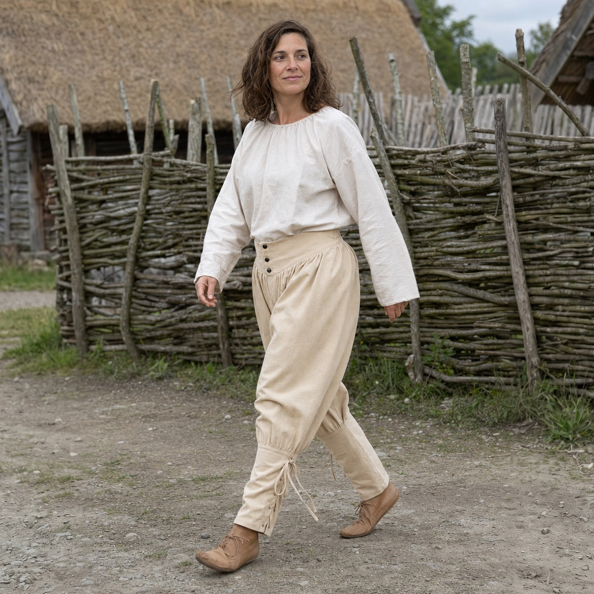 Off-White laced trousers with ankle ties worn outdoors