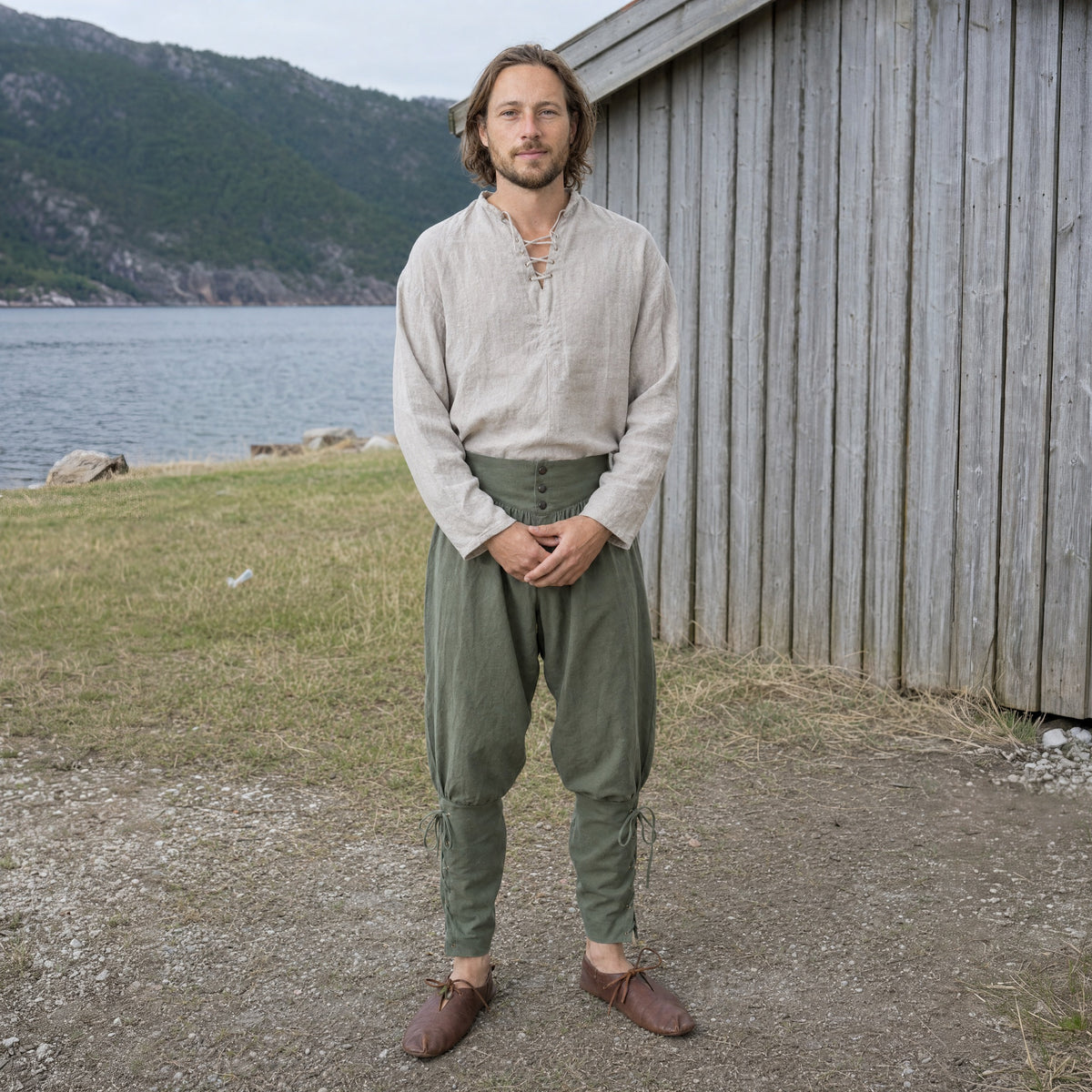 Army Green laced trousers with ankle ties worn outdoors, full-length front view