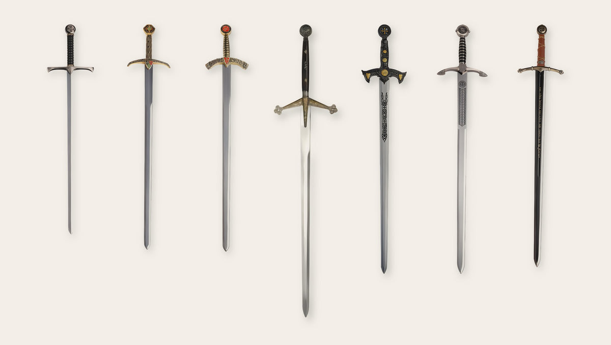 Seven two-handed swords and longswords in a row, with a 134 cm Scottish claymore in the middle