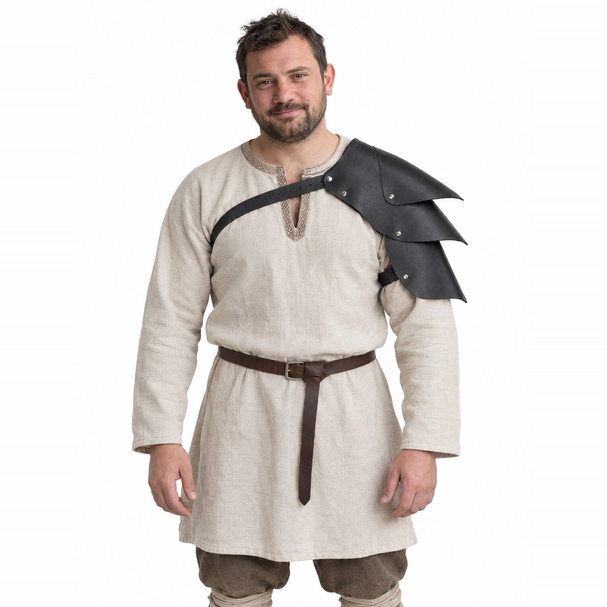 Black layered shoulder armour worn by a model on a white background